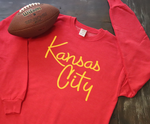 Kansas City Script Font on Red Crew Neck Sweatshirt