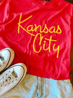 Kansas City Script Font on Red