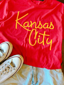 Kansas City Script Font on Red