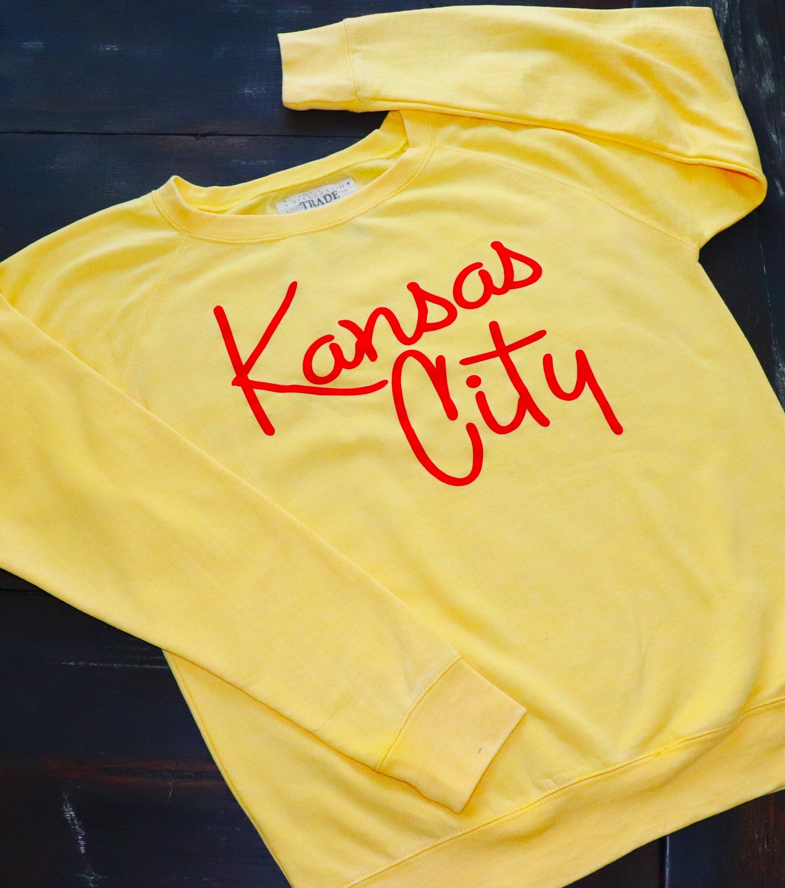 Kansas City Script Font on Yellow Crew Neck Sweatshirt